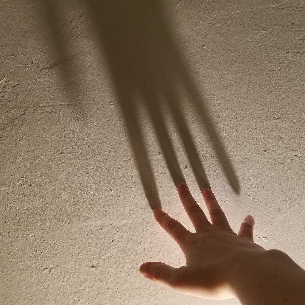 This image has an empty alt attribute; its file name is reaching.jpg